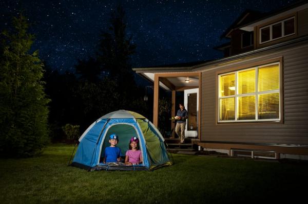 Kids in a backyard tent